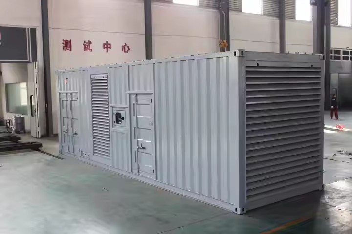 Silent container generator enclosure with ventilation louvres along one side and access doors at the end