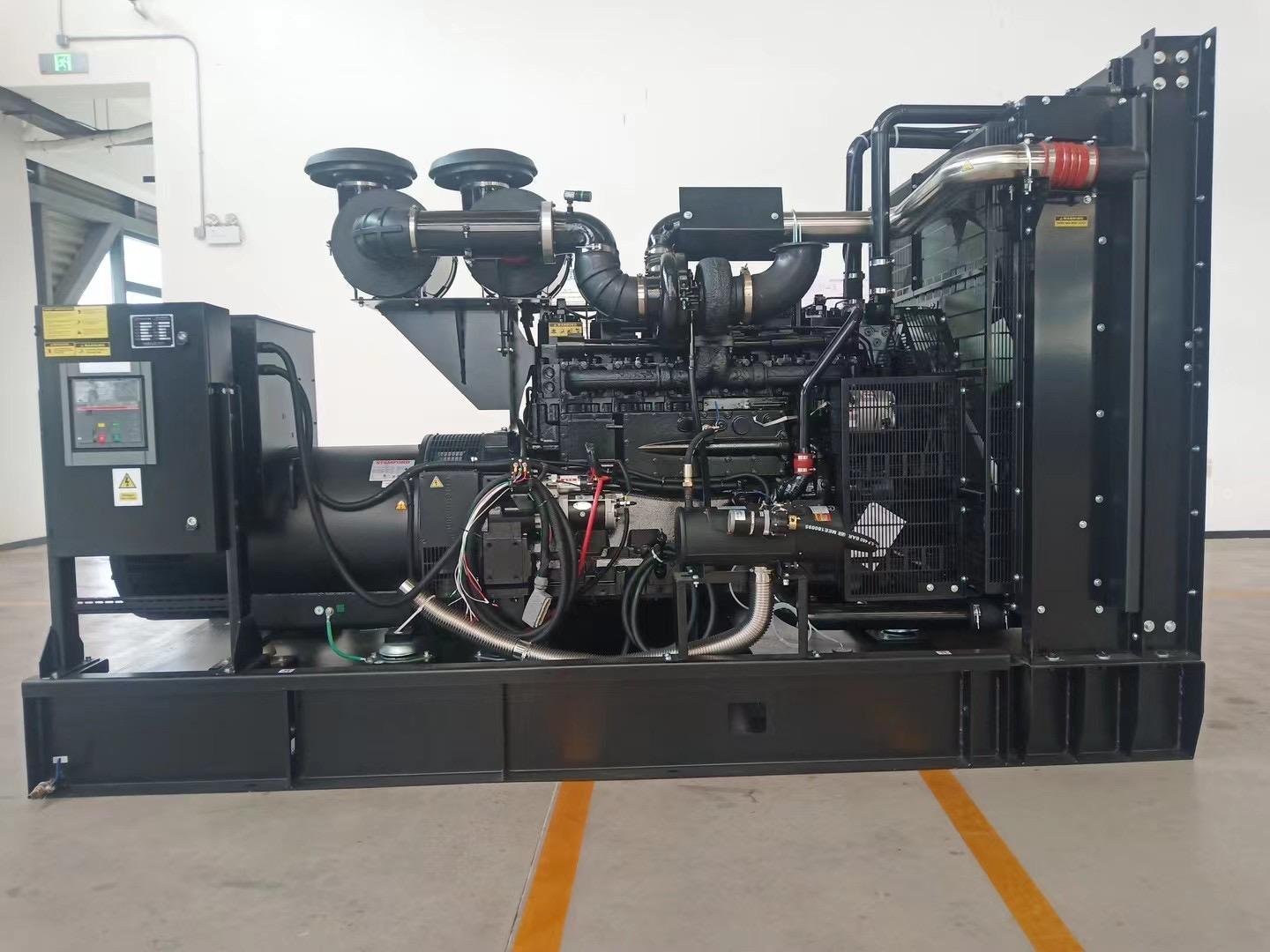 Open-frame Cummins diesel generator set standing on a concrete pad in an industrial yard
