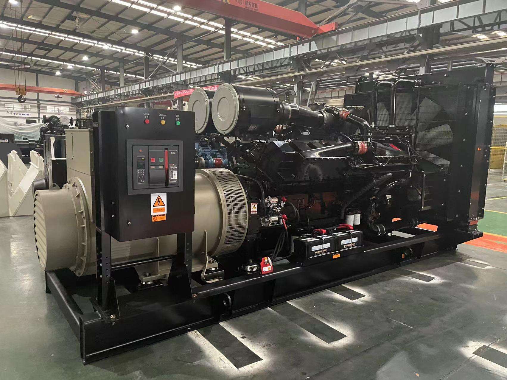Open-frame diesel generator set with its control panel and circuit breaker on the factory floor before export packing